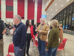 Perry County Commissioner Ben Carpenter talking with community members at the 2024 Groundhog Day Breakfast