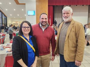 Perry County Commissioner Ben Carpenter talking with community members at the 2024 Groundhog Day Breakfast