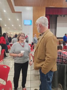 Perry County Commissioner Ben Carpenter talking with Angie Gussler